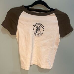 Brandy Melville John Galt women’s brown and crime graphic short sleeve t-shirt